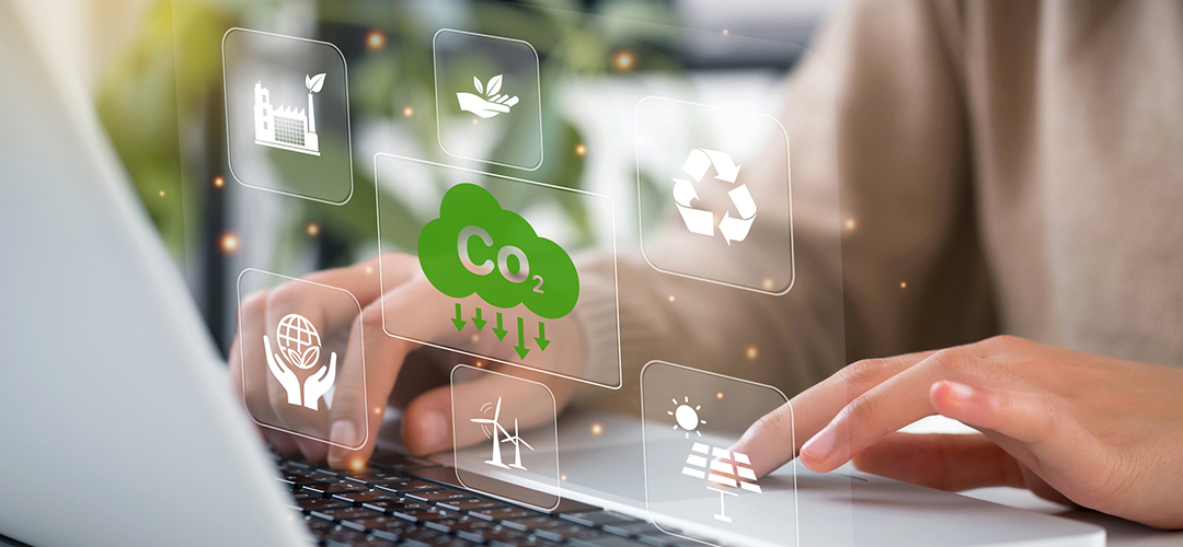 women using laptop for working technology and business Net zero and carbon neutral concept. Renewable energy-based green businesses can limit climate change and global warming. Reduce CO2 emission.